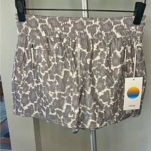 Vuori Women's Athletic Shorts in Gray and White